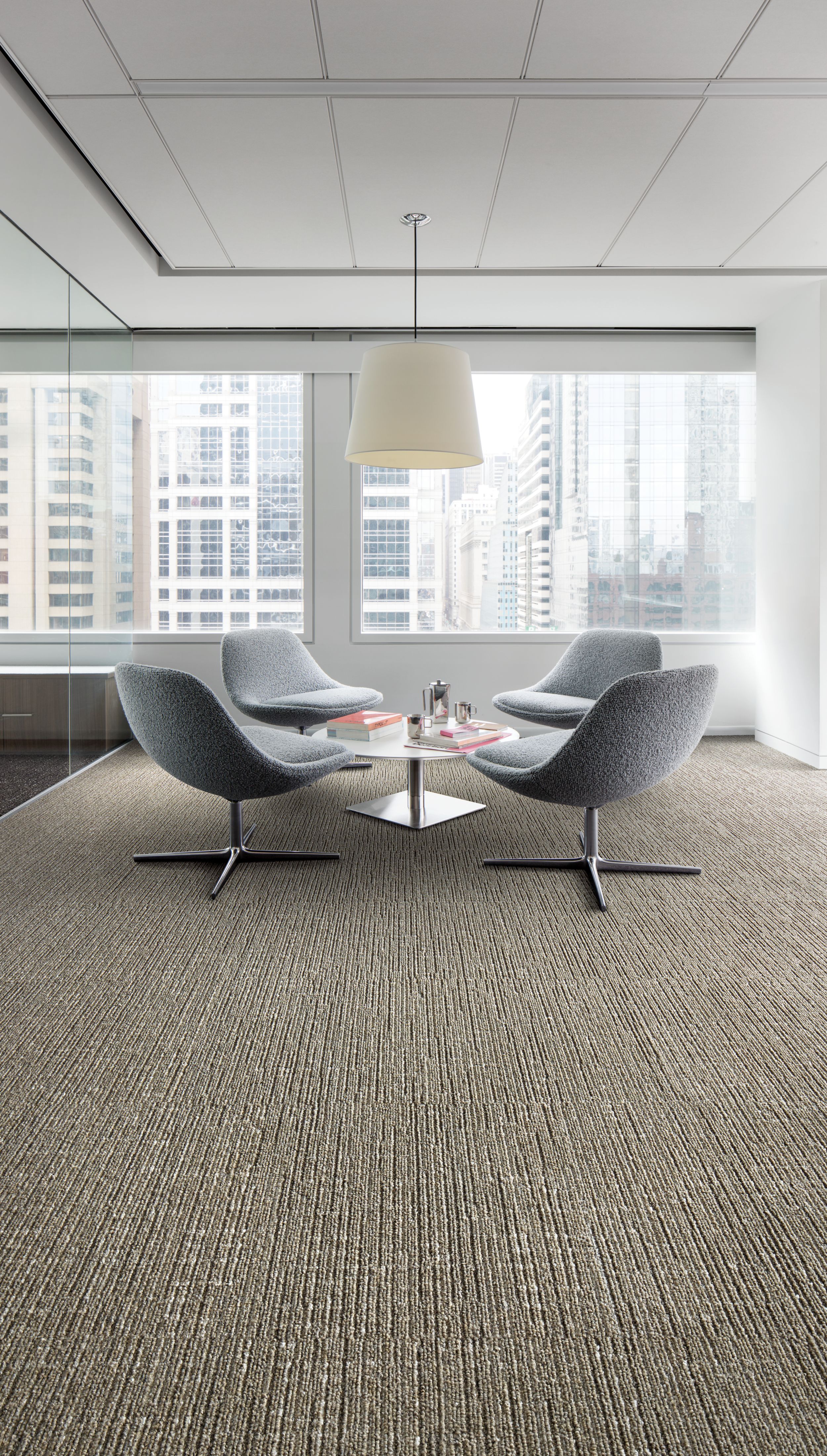 Interface Night Flight carpet tile in office sitting area with large windows and city view image number 8